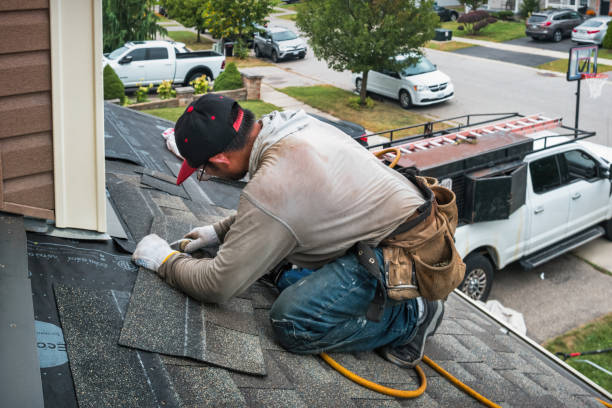 Professional Roofing technician working in South Beach, OR